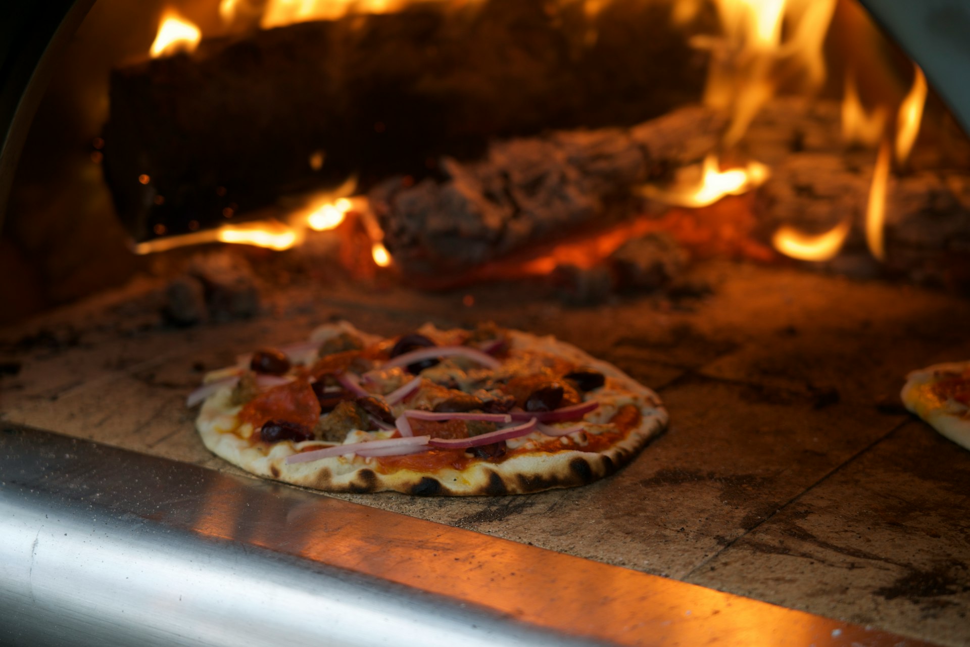 cooked pizza inside oven